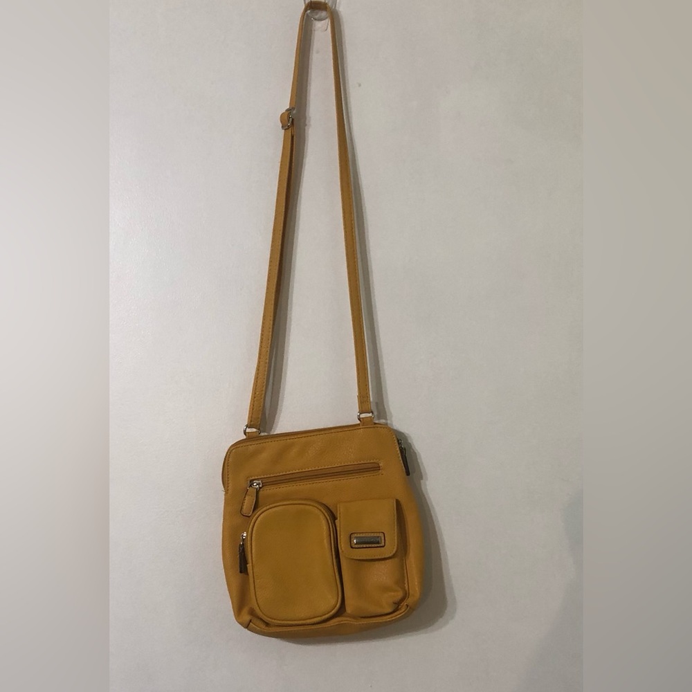 Strada women’s crossbody bag multiple  outside and inside zip pockets yellow.